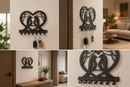 Two sweet lovebirds perched facing each other inside a stylized modern heart outline metal wall key holder with 7 hooks by Metal Studio
