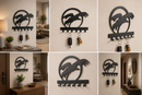Powerful majestic eagle bird of prey soaring across a clean circular moon frame outline metal wall key holder with 7 hooks by Metal Studio